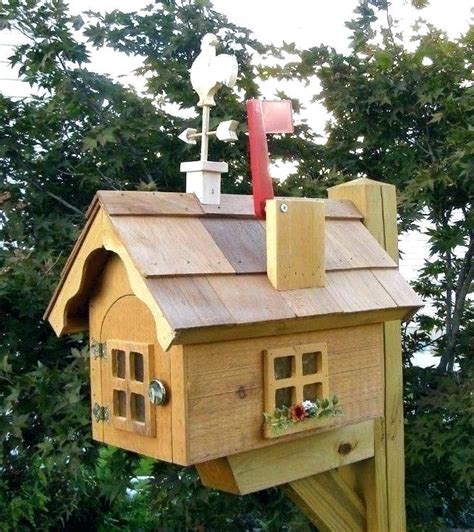 wooden house shaped mailbox